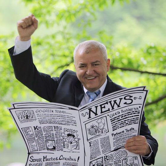 businessman reading a newspaper